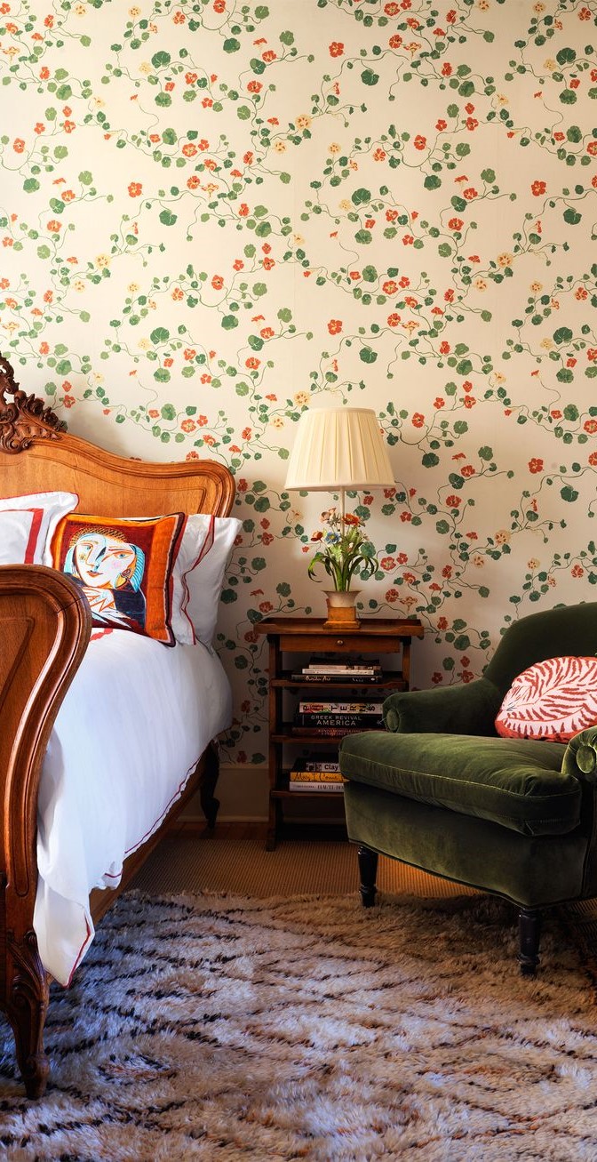 Elegant floral vine wallpaper in a cozy bedroom