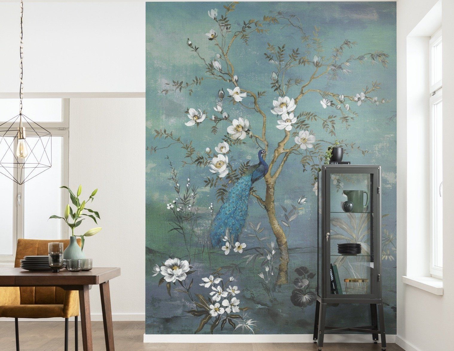 Teal peacock mural with white blossoms